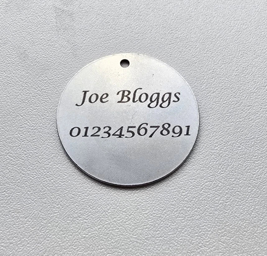 Personalised pet tag. Dog and cat collar tag. Pet safety. Contact number for lost dogs and cats.
