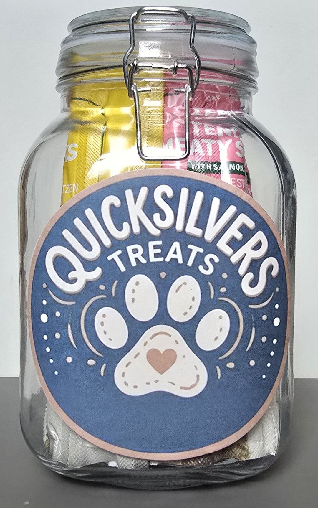 Dog and cat treat jar with personalised label.