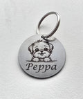 Personalised pet tag. Dog and cat collar tag. Pet safety. Contact number for lost dogs and cats.