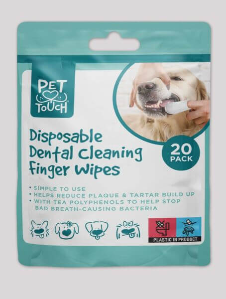 Disposable dental cleaning finger wipes for dogs. Dog and puppy teeth brushing.